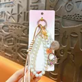Colgante de bolso creativo estilo Miu con cuentas de perlas y mini bolso de mano - Marrón