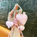 Rosa herzförmiges PU-Leder-Handy-Lanyard mit gewebtem Ball und silbernen Schlüsselanhängern - Rosa