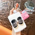 Compact white plush keychain featuring plaid bow and internal foldable makeup mirror - Bowknot Folding Mirror Pendant / White