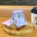 Purple mini handheld arcade game console keychain toy with classic retro gaming screen - Arcade Game Console Pendant / Purple