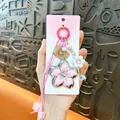 Cute pink cherry blossom alloy keychain with braided rope and flower bead accessory - Flower Pendant / Rose Red
