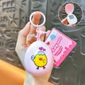 Pink egg-shaped virtual pet electronic game keychain featuring a cute chick illustration - Egg Shaped Game Console Pendant / Pink