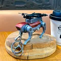 Creative mechanical robot dog keychain with drone propeller decor in red and metallic grey - Pull-Back Mechanical Dog Pendant / Red