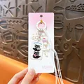 Adorable black cat keychain bag charm with white flower and braided cord accessory - White - Cute Cat Bag Charm