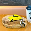 Yellow alloy retro car keychain on wooden display for bag pendant - Beetle Car Charm / Yellow