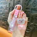 Cute pink and grey glass-like bear keychain with glitter strap for bag decoration - Pink