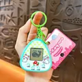 Retro mini handheld electronic game keychain in light green with cute animal decals - Cat Pet Console Pendant / Green