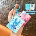 Mini handheld electronic game machine keychain with blue cartoon rabbit book cover design - Book Shaped Game Console Pendant / Blue