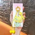 Adorable yellow tulip plush keychain pendant featuring a heart bead and flower ring - Tulip Flower Bag Charm / Yellow
