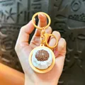 Handheld glowing Xiaolongbao keychain decompression toy with yellow ring and clip - Shumai / Luminous Button Charm