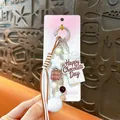 Cute chocolate themed keychain with white pom-pom and star beads - Chocolate Pompom Charm / White