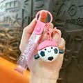 Porte-clés poupée football rose avec sangle pailletée "JUST KEEP DOING IT" pour sac. - Pendentif Poupée de Football Sportif / Rose