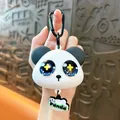 Adorable cartoon panda squeeze toy keychain with starry eyes and a black carabiner clip - Panda Squishy / Star Eyes