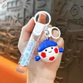 Mignon porte-clés poupée de football souriante pour sac ou voiture avec sangle bleue - Pendentif Poupée de Football Sportif / Bleu foncé