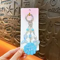 Mignon porte-clés en acrylique bleu clair avec coquillage et queue de sirène pour sacs et étuis - Bleu - Charme de Coquillage Océan à Paillettes