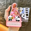 Adorable pink panda-themed squeeze toy keychain, a perfect cartoon charm for bags and keys. - Panda Electronic Piano / Pink