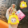 Cute yellow cat space capsule keychain with squeeze sound feature and pink decorative tag - Cat Space Capsule (Squeaky Version) / Yellow