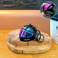 Cool matte black motorcycle helmet keychain with iridescent colorful visor - Iridescent Helmet Pendant / Black