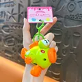 Creative green and orange wind-up jumping fish keychain toy for stress relief gift - Clownfish Wind-up Pendant / Green