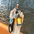 Vintage black LED lantern keychain with warm glowing light and braided rope lanyard - Retro Square Lamp / Black