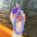 Charming purple AB beaded phone strap with embossed heart tag for bags and keychains - Purple