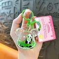 Adorable panda liquid shaker keychain accessory with green ring and boutique pink tag label - Panda Quicksand Bear Head / Green