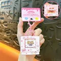 Pink cartoon glowing stress relief keychain with rotating square and bunny design. - Pink