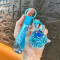 Porte-clés requin bleu avec sable mouvant liquide et bracelet à paillettes chic - Pendentif Requin Marin Rempli d'Huile / Bleu lac
