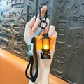 Creatieve mini vintage LED lantaarn sleutelhanger met warm licht en zwart koord - Retro Paleislamp / Zwart