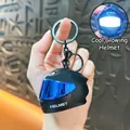 Cool glowing motorcycle helmet keychain pendant in stylish matte black and vibrant blue - Black