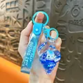 Cute blue dolphin sea shell liquid glitter keychain with 'Just Keep Doing It' wrist strap - Whale