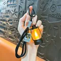Decoratieve miniatuur retro LED lantaarn sleutelhanger met warm licht en zwart koord - Vintage olielamp / Zwart