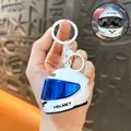 Glowing white motorcycle helmet keychain with a shiny blue visor for bag accessories. - White