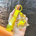 Porte-clés requin jaune avec paillettes liquides et dragonne arborant un texte motivant - Pendentif Requin Marin Rempli d'Huile / Jaune