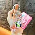 Adorable panda liquid keychain candy shaped charm with a pink boutique brand tag - Candy Shaped Liquid Quicksand Panda Charm / Pink