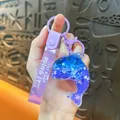 Cute blue liquid quicksand dolphin keychain with purple strap and sparkling glitters - Oil Injected Ocean Whale Pendant / Purple
