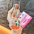 Handheld cute liquid heart keychain featuring a panda figurine and shiny red glitter - Heart Lock Shaped Liquid Quicksand Panda Charm / Pink
