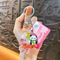 Cute liquid shaker panda keychain in lollipop shape with a pink boutique display tag - Lollipop Shaped Liquid Quicksand Panda Charm / Pink