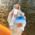 Adorable blue oil-filled whale keychain with liquid glitter quicksand and wrist strap - Oil Injected Ocean Whale Pendant / White