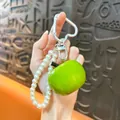 Creative green resin apple keychain with white pearl beaded strap and heart clip - Green