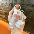 Creative liquid oil-filled sheep keychain with quicksand effect and clear strap - Candy Shape