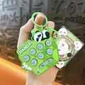 Green panda handheld game fidget toy keychain with silicone buttons and cute panda charm. - Panda Whack-a-Mole Pendant / Green