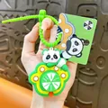 Cute cartoon panda game machine squishy keychain toy in bright green for bag decor - Panda Spinner Pendant / Green