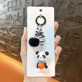 Adorable panda squeeze toy keychain featuring a black pom-pom and stylish bead strand. - Panda Phone Chain Pendant / Basketball Style-Blue