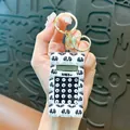 Cute panda calculator keychain with soft silicone squishy panda head decorative edge - Panda Mini Calculator Pendant / Black and White