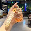 Portachiavi creativo a forma di sveglia con glitter liquidi, personaggio e cinturino - Arancione