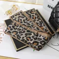 Detailed view of the leopard print pattern and satin texture of the double-layer silk scarf - L040-08-04 Leopard Print - Camel