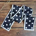 Close-up detail of a retro French style polka dot skinny scarf on wood surface. - Black And Silver Polka Dots / 10*100cm