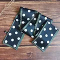 Detailed close-up showing texture of retro dark green polka dot silk-like scarf hairband - Dark Green Polka Dot / 10*100cm