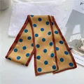 Close-up of a French retro skinny silk scarf with blue polka dots on a gold background - Brown And Blue Polka Dots / 10*100cm